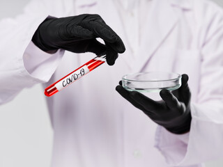 lab white coats black gloves covid-19 blood diagnostics
