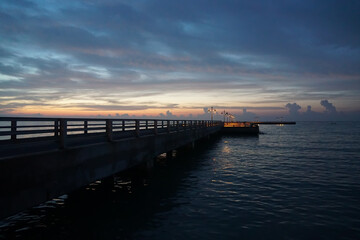 Fototapeta na wymiar Empty Key West pier just before sunrise