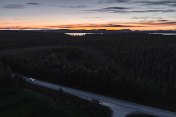 Sunset in Lapland Finland on an autumn evening seen from the air in the wilderness - 398959585