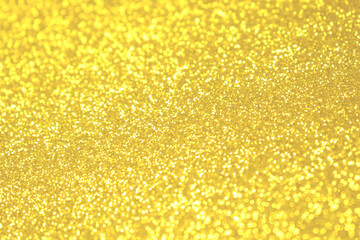Illuminating yellow festive background. Inspiration in trendy colors of 2021. Glitter in blur