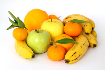 Fruits tangerines, apples and bananas on a white background