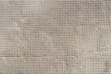 old cement floor with a messy pattern of dots. texture for industrial background