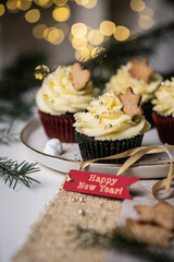 Chocolate and cherry cupcakes with mascarpone frosting and gingerbread cookies with 