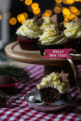 Chocolate and cherry cupcakes with mascarpone frosting and gingerbread cookies with 