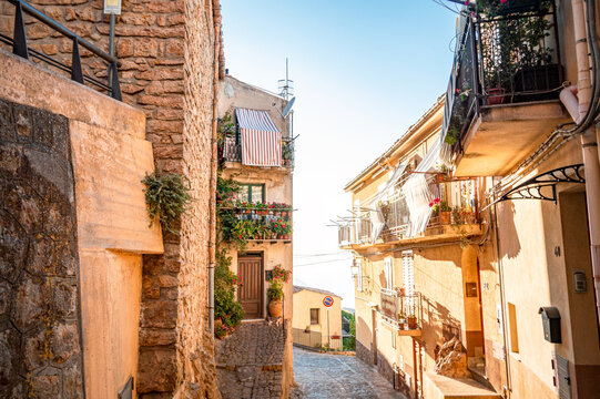 Pollina, Palermo, Sicily (Sicilia), Italy - August 16th, 2019: colorful typical Sicilian town and architecture at sunset