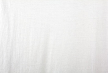 White crumpled cotton textile. White fabric texture background.