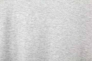 Grey blank crumpled cotton textile background. Closeup grey fabric texture.