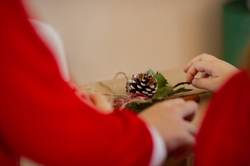 Children pack gifts for the new year and Christmas