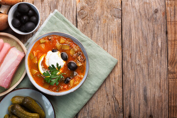 Solyanka, Russian soup with sausage, olives and capers