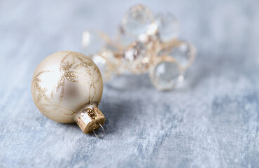 Christmas ornaments on bright wooden background.	