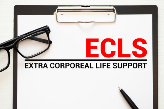 Doctor holding a card with text ECLS Extra Corporeal Life Support medical concept.
