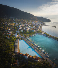 Methana coastline and marina in Aegean sea, Greece. - 398972542