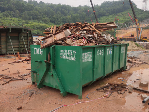 KUALA LUMPUR, MALAYSIA -MARCH 13, 2020: Huge wasted disposal bin used to collect rubbish and unused material from the construction site. Has a fixed collection schedule