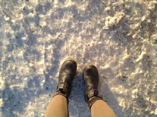 Working boots in cotton dust that looks like snow