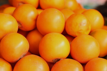 Lulo fruit from the warm zone of Colombia, with a strong and delicious flavor