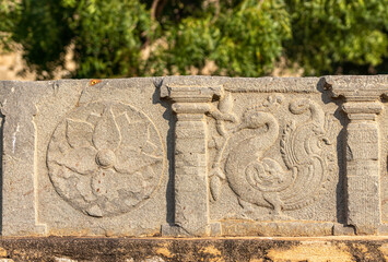 Hampi, Karnataka, India - November 4, 2013: Mural sculpture on gray stone at Royal Enclosure....