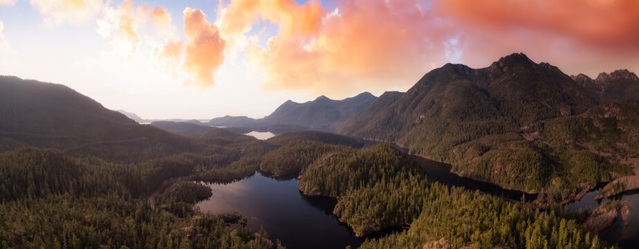 Beautiful Aerial Panoramic View of Larry Lake. Colorful Sunset Sky. Located on the West Coast of Vancouver Island near Tofino and Ucluelet, British Columbia, Canada.