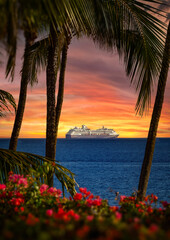 Hawaiin cruise setting sail during sunset