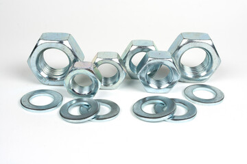 metal nuts and washers on a white background