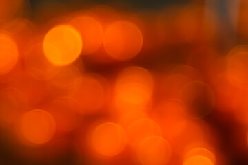 Christmas background red holiday abstract light bokeh and glitter abstract red orange defocused, Gold and black glitter lights with black dark background.