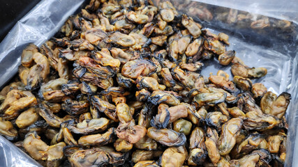 Dried oysters display on market