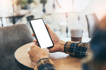 cell phone blank white screen mockup.woman hand holding texting using mobile on desk at office.background empty space for advertise.work people contact marketing business,technology