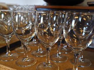 Classical wine glasses on a restaurant bar counter