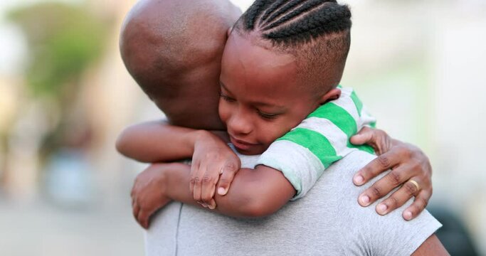Child hugging father. Back son and dad bonding together. Family love embrace