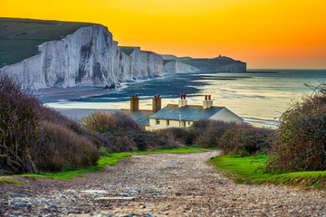 Image of The Coast Guard Cottages & Seven Sisters Chalk Cliffs at sunrise in Sussex, England, UK printed on Printed Glass Placemats
