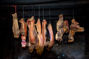  pork meat upstairs kitchen. Dry pork ( called Gac Bep pork) on dark background. This is one of Traditional dishes of ethnic H'Mong people in Ha Giang Province , Viet Nam