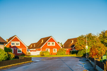 View of traditional Scandinavian timber houses in autumn season