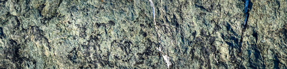 Closeup of blue green rock as a nature background

