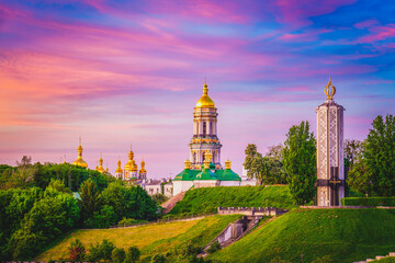 Fototapeta na wymiar Beautiful summer sunrise of Kiev Pechersk Lavra Orthodox Monastery. Great morning view of Kiev, capital of Ukraine, Europe