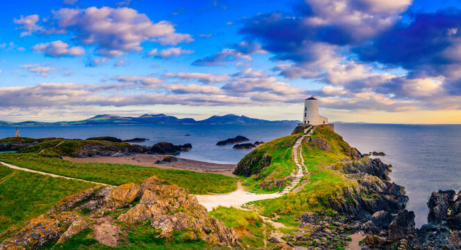 Sunset view of Lighthouse on Llanddwyn Island at the coast of Anglesey in North Wales,UK
