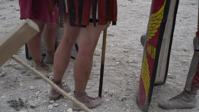 Soldiers of the Roman Empire. Ancient Roman military clothing. Armour, tunic, helmet, greaves, sandals, mail, lorica, balteus, weapons, shield and sword