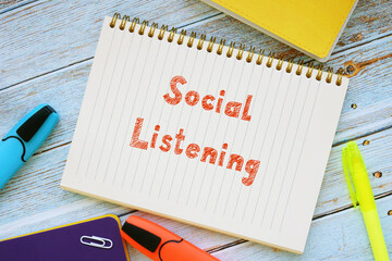 Financial concept about Social Listening with sign on the sheet.