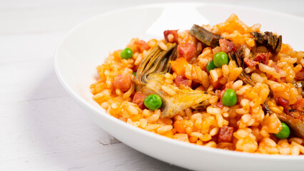 Plate of paella with vegetables