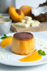 Pudding with coconut, peach and white chocolate