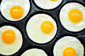 Cooking eggs with a multiple egg pan