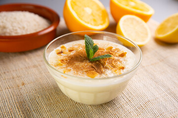 Milk rice with almonds and orange