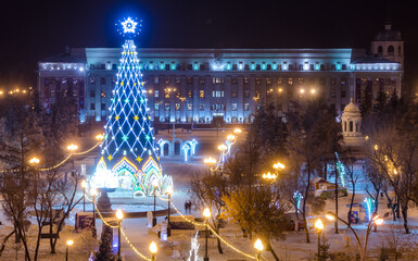 Christmas tree in Irkutsk city at night on the main square of Kirov