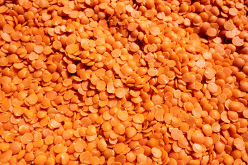 top view of red lentil (Masoor dhal) isolated on floor