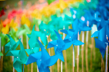 Colorful pinwheel on blur background