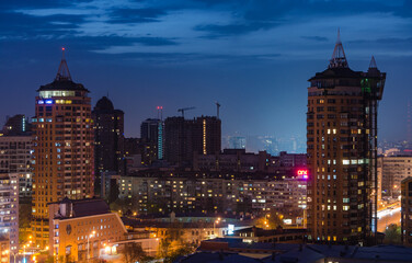 Fototapeta na wymiar New buildings in Kiev city at night 