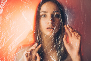 Pandemic self isolation. Defocused portrait. Quarantine anxiety. Panic attack. Disturbed woman...