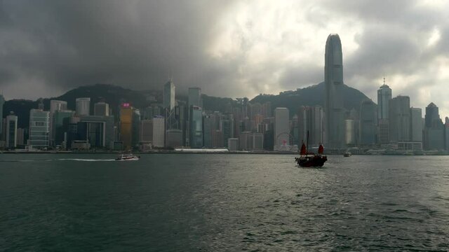 View of Hong Kong Victoria Bay and Victoria Peak with 2 Boats Crossing Paths 4k