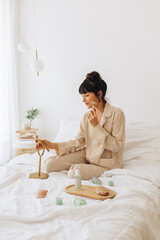 Woman doing facial at home