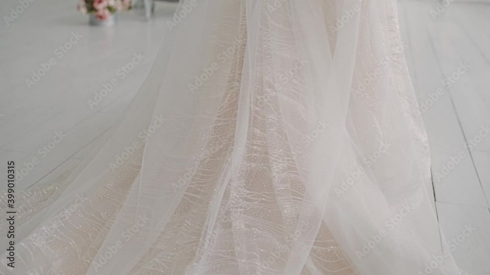 Canvas Prints beautiful wedding dress stretches across the floor