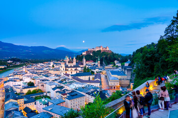 Centre of Salzburg overlooking Hohensalzburg Fortress at blue hour. Austria