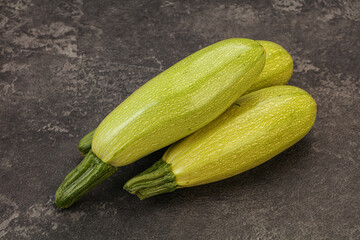 Young tasty zucchini over board